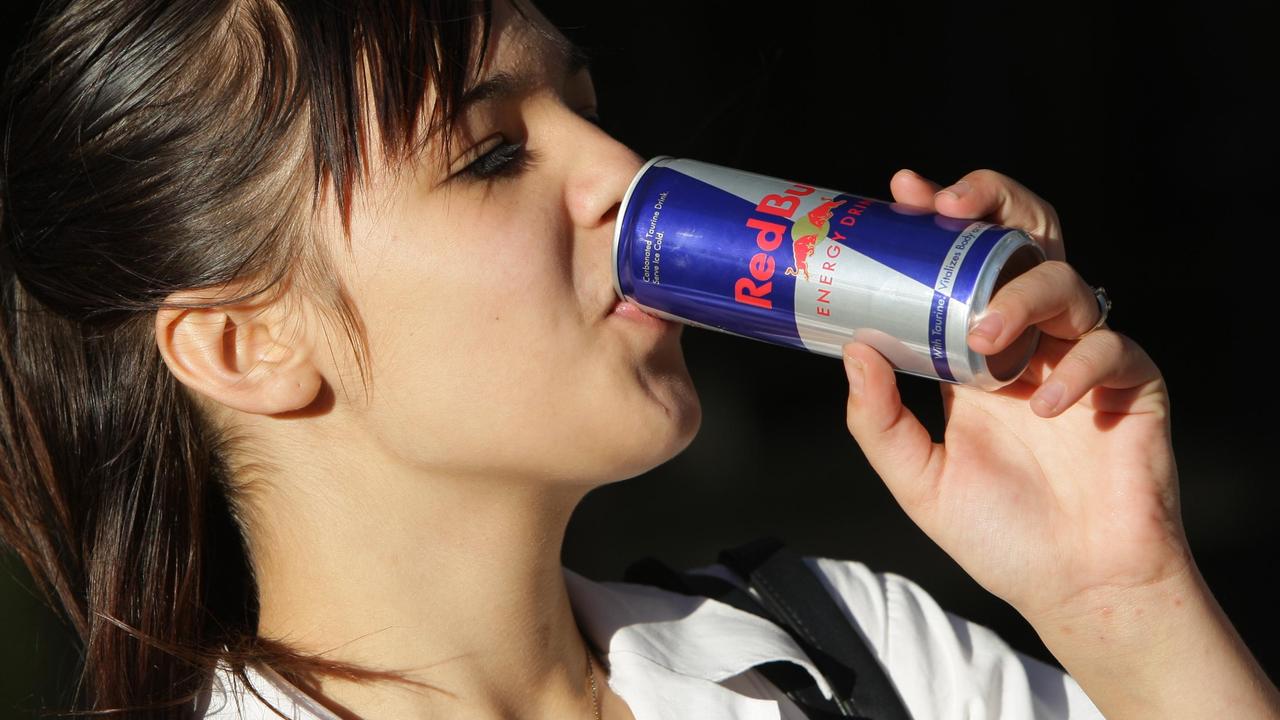 woman drinking energy drink